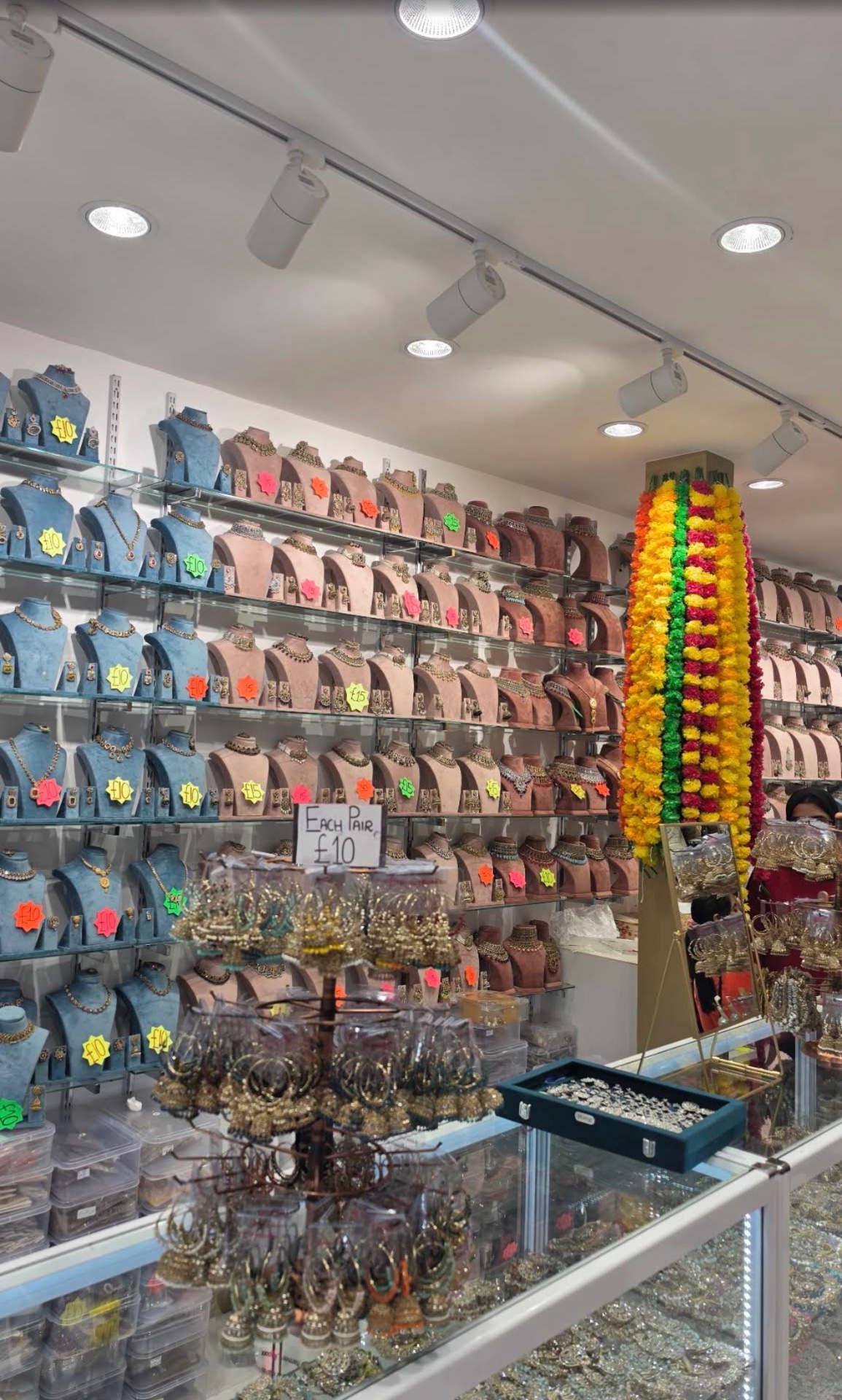 Wall of ladies jewellery, necklaces and earrings on display