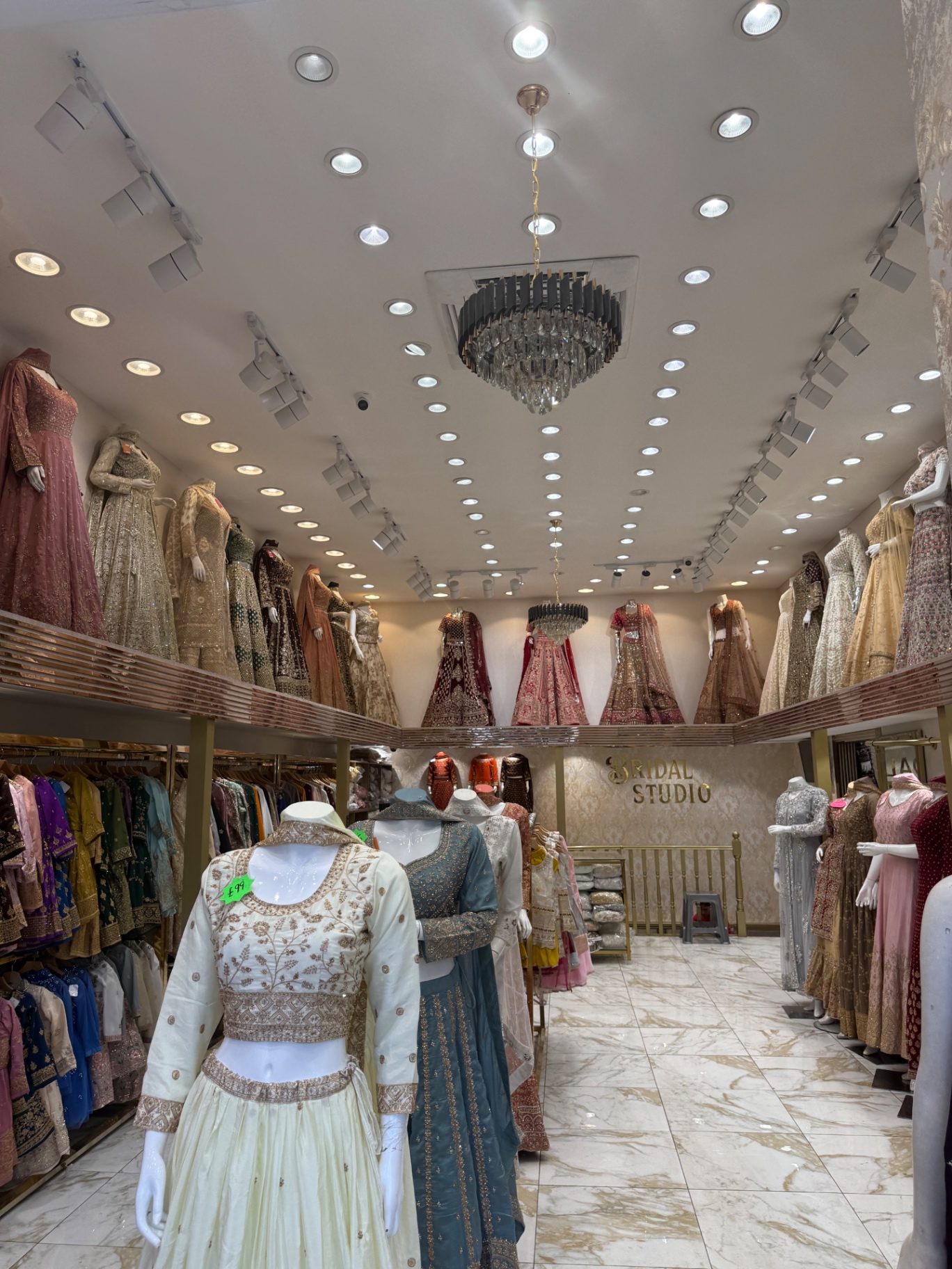 Interior of the bridal studio with lenghas and embroidered outfits
